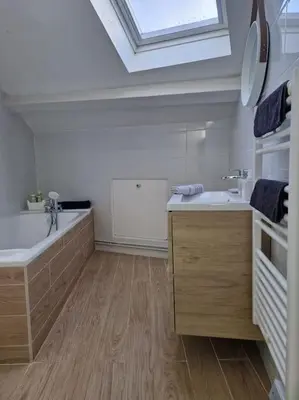 Un ou plusieurs lits dans un hébergement de l'établissement Appartement T2 Le central