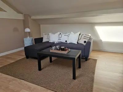 Coin salon dans l'établissement Appartement T2 Le central