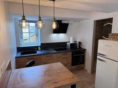 Cuisine ou kitchenette dans l'établissement Escapade à Pommard