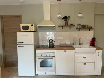 Cuisine ou kitchenette dans l'établissement Studio Le petit métayer