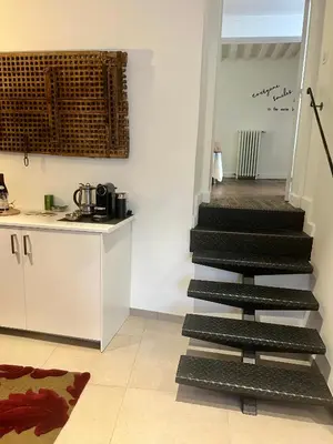 Cuisine ou kitchenette dans l'établissement Suite Clos Ahimsa