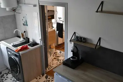 Cuisine ou kitchenette dans l'établissement Le cocon de Julia