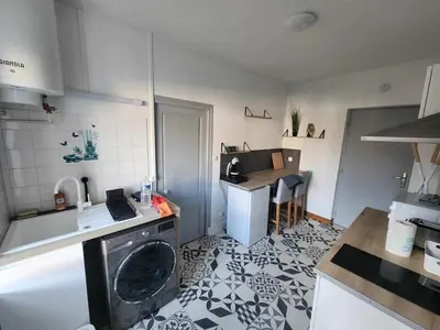 Cuisine ou kitchenette dans l'établissement Le cocon de Julia