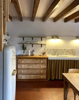 Cuisine ou kitchenette dans l'établissement Maison Au bois du Haut Folin