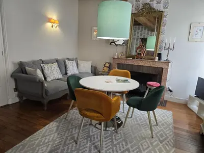 Coin salon dans l'établissement Bel appartement
