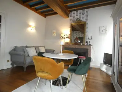 Coin salon dans l'établissement Bel appartement