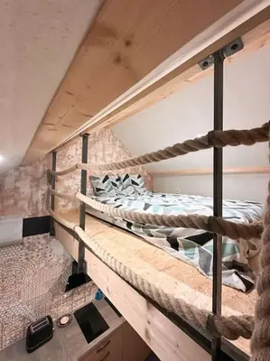 Un ou plusieurs lits superposés dans un hébergement de l'établissement La mezzanine