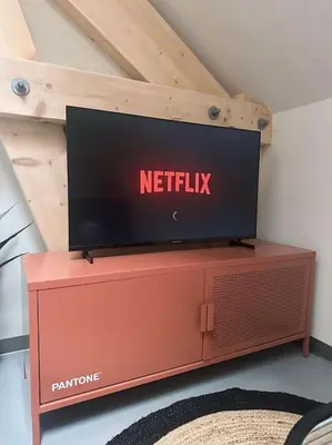 Télévision ou salle de divertissement dans l'établissement La mezzanine