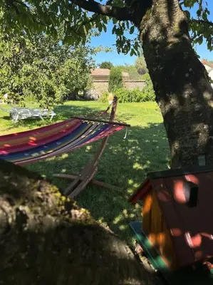 Jardin de l'établissement Maisonnette au calme, grand jardin privatif, accueil vélos et motos