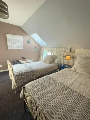 Un ou plusieurs lits dans un hébergement de l'établissement La maison Villecharny