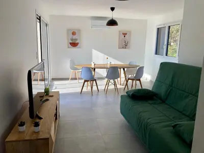 Coin salon dans l'établissement Le gîte de la fontaine - le renard