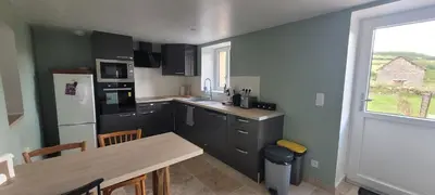 Cuisine ou kitchenette dans l'établissement Gîte de la Doue