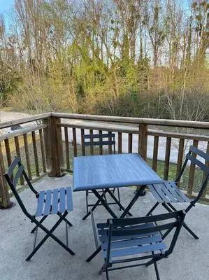 Balcon ou terrasse dans l'établissement Séjour aux allées du Green, piscine & SPA