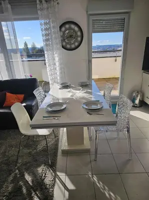 Coin salon dans l'établissement appartement