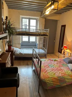 Un ou plusieurs lits dans un hébergement de l'établissement La petite maison d issy
