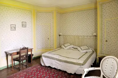 Un ou plusieurs lits dans un hébergement de l'établissement Escapade au domaine-Chateau de Bresse sur Grosne