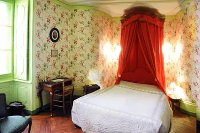 Un ou plusieurs lits dans un hébergement de l'établissement Escapade au domaine-Chateau de Bresse sur Grosne