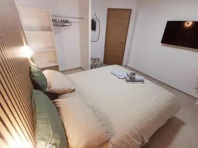Un ou plusieurs lits dans un hébergement de l'établissement Magnifique duplex neuf parking et terrasse