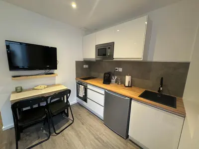 Cuisine ou kitchenette dans l'établissement Logust