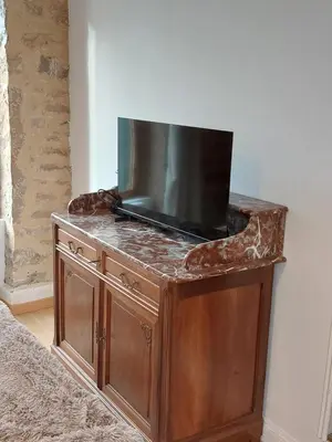 Télévision ou salle de divertissement dans l'établissement Studio 20m2 - stationnement gratuit - WiFi
