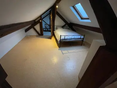 Un ou plusieurs lits dans un hébergement de l'établissement Appartement 3 chambres climatisé 100m2