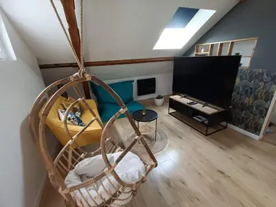 Télévision ou salle de divertissement dans l'établissement Nid de charme pour soirée romantique
