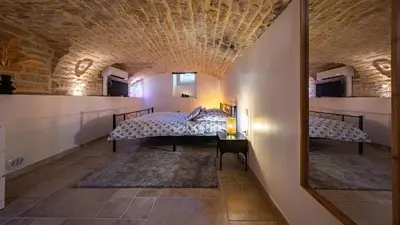 Un ou plusieurs lits dans un hébergement de l'établissement Le loft sur rivière
