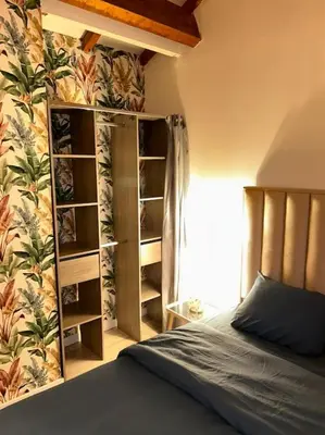 Un ou plusieurs lits dans un hébergement de l'établissement Le 8 Appartement - Le Duplex II - parking gratuit -