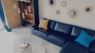 Coin salon dans l'établissement Ferme