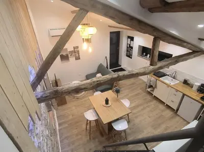 Coin salon dans l'établissement Le gîte du Verger - Appartement à Arc et Senans