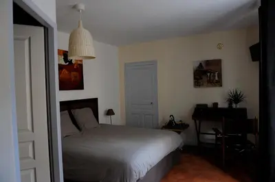 Un ou plusieurs lits dans un hébergement de l'établissement B&B Chez Marie