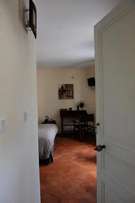 Un ou plusieurs lits dans un hébergement de l'établissement B&B Chez Marie