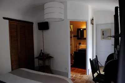 Un ou plusieurs lits dans un hébergement de l'établissement B&B Chez Marie