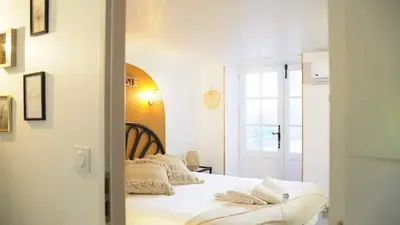 Un ou plusieurs lits dans un hébergement de l'établissement Gîte Du Pré Pommier - Clim - Piscine - Sauna