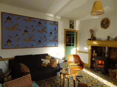 Coin salon dans l'établissement Maison p'tite Anne
