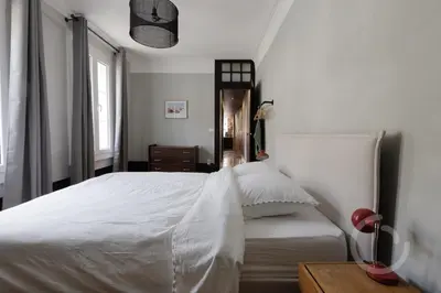 Un ou plusieurs lits dans un hébergement de l'établissement La troussotte, superbe appartement de 110m2 avec terrasse et jardin