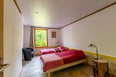 Un ou plusieurs lits dans un hébergement de l'établissement le Shed - gîtes de Banne 70