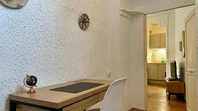 Cuisine ou kitchenette dans l'établissement Au coeur d'Autun