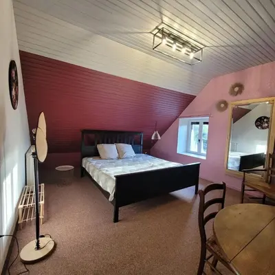 Un ou plusieurs lits dans un hébergement de l'établissement Maison de charme 175m2 - 5 chambres