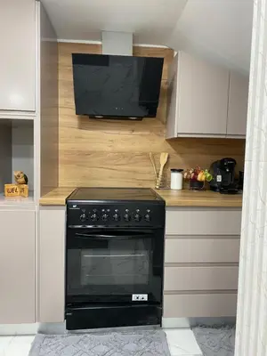 Cuisine ou kitchenette dans l'établissement Studio Moderne et Parking gratuit