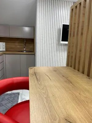 Cuisine ou kitchenette dans l'établissement Studio Moderne et Parking gratuit