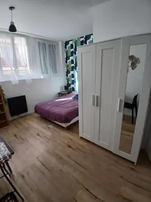 Un ou plusieurs lits dans un hébergement de l'établissement Comfortable studio pour 2 personnes
