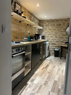 Cuisine ou kitchenette dans l'établissement Comme à la maison