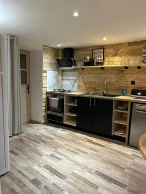 Cuisine ou kitchenette dans l'établissement Comme à la maison