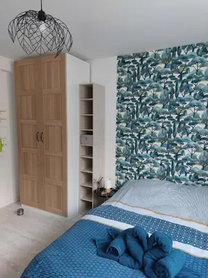 Un ou plusieurs lits dans un hébergement de l'établissement Studio pour deux - WiFi