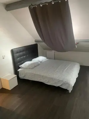 Un ou plusieurs lits dans un hébergement de l'établissement Duplexe Fenay 15 min de dijon