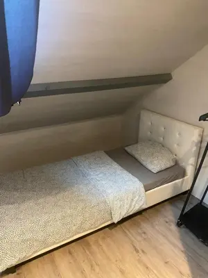 Un ou plusieurs lits dans un hébergement de l'établissement Duplexe Fenay 15 min de dijon
