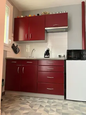 Cuisine ou kitchenette dans l'établissement Cosy T2 centre-ville