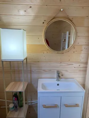 Salle de bains dans l'établissement Chalet - Spa Jacuzzi le Rouge-Gorge