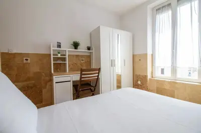 Un ou plusieurs lits dans un hébergement de l'établissement Le Martre - Apt 4 Personnes, 2 ch, avec Balcon